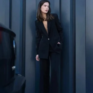 Pantalon noir Élégant Avec Boutons Argentés au pied